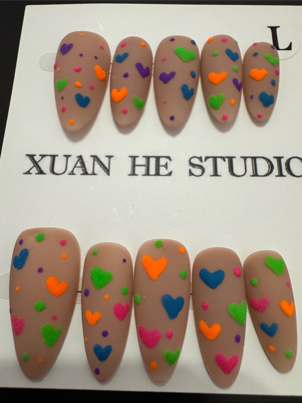 Nude Matte Press-On Nails with Neon Heart Accents